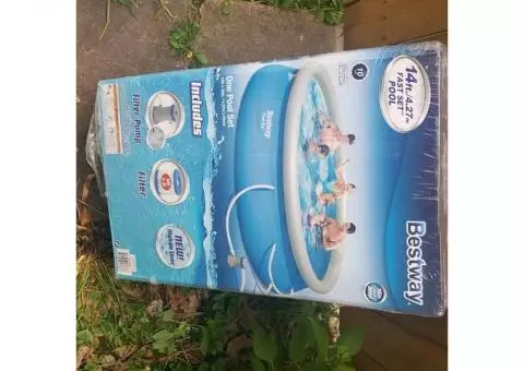 14' Inflatable Pool with filter pump and cover...brand new!!!